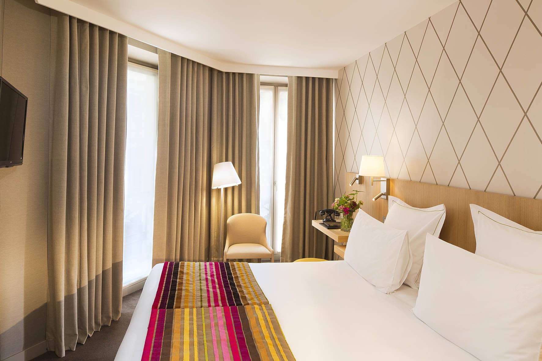 Chambre Corner de l'hotel Cordelia Paris, decoration elegante et confort boutique hotel